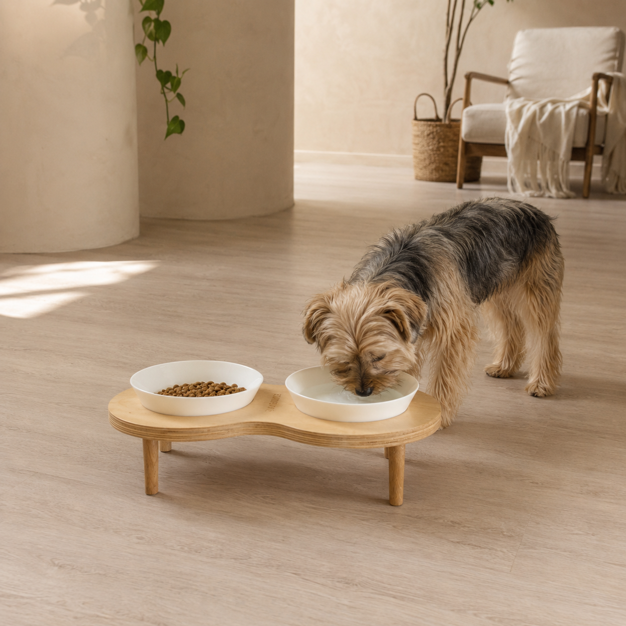 ARCH elevated wooden feeder detail, glazed ceramic bowls dropped into the birch figure-eight, made in Egypt by PawLuxe.